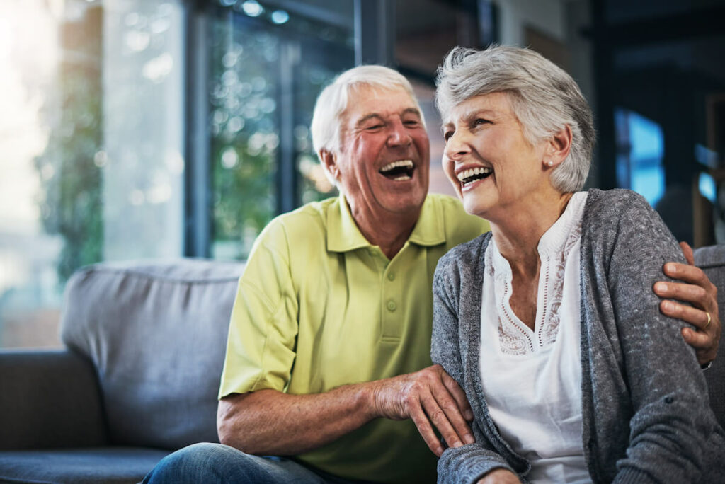 Sage Oak of Denton | Happy senior couple laughing together