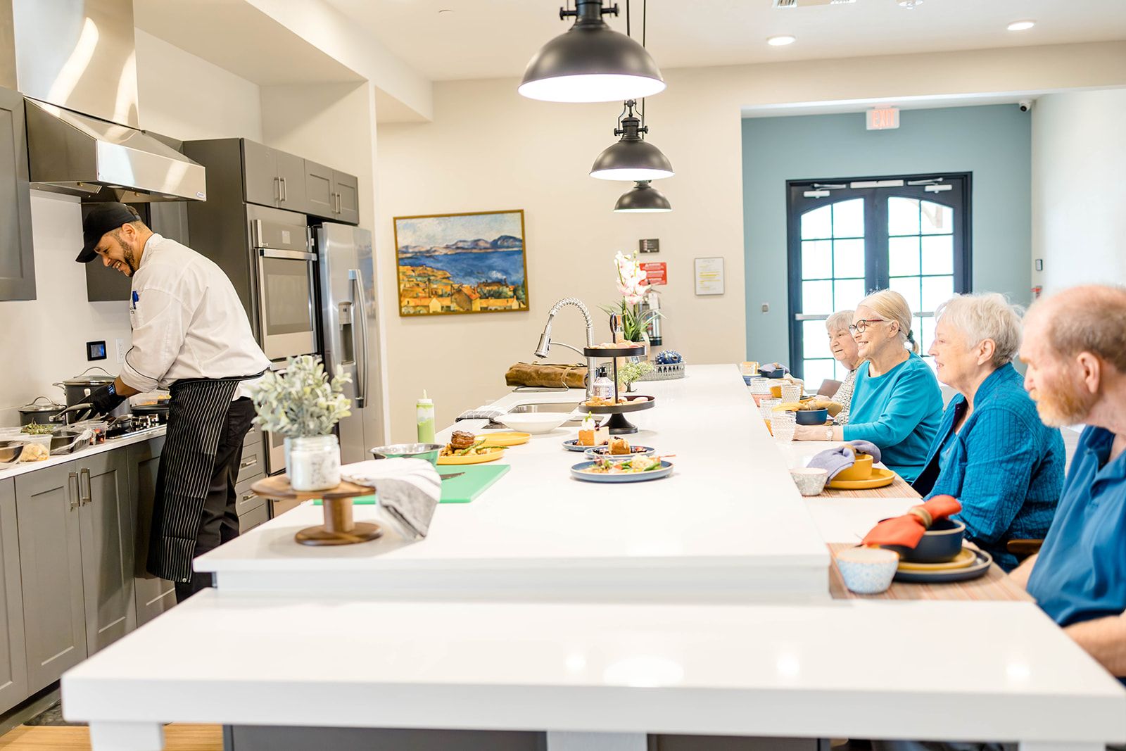 Sage Oak of Denton | Chef serves prepared food to residents