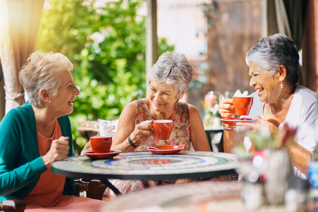 Sage Oak of Denton | Senior women drinking tea outside