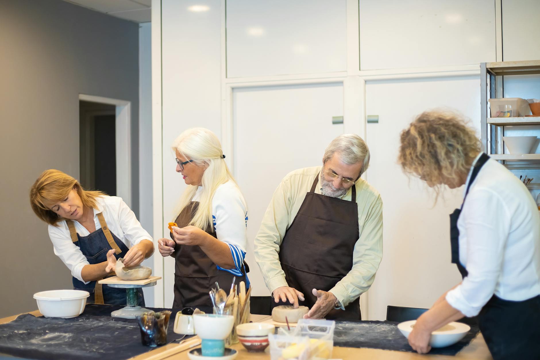 people doing pottery