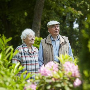 Sage Oak of Denton | Senior couple in a garden