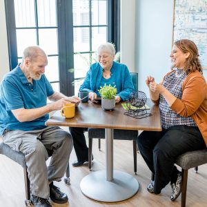 sage-oak-of-denton-assisted-living-memory-care-seniors-playing-bingo.jpg